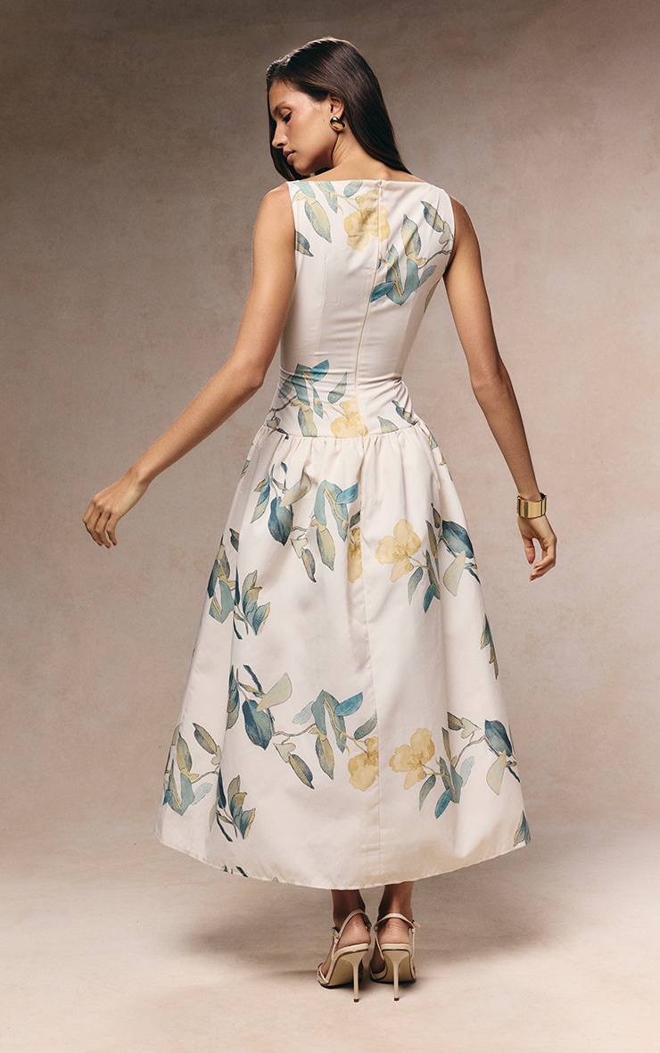 Robe mi-longue jaune fleurie à taille tombante image 2