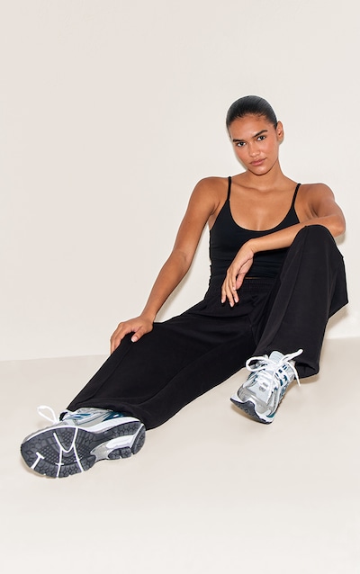 Jogging oversize noir à pinces et ourlets resserrés