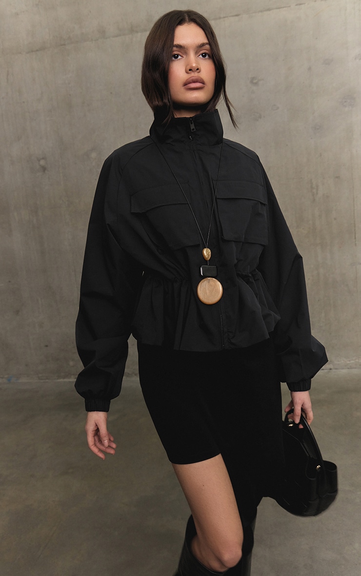 Black Cinch Waist Pocket Detail Rain Coat image 1