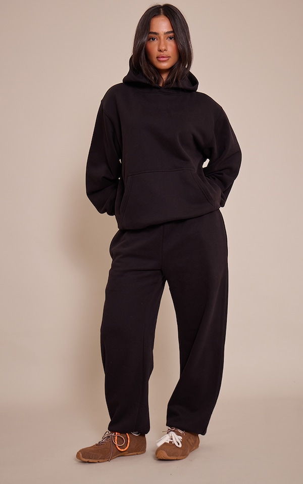 Petite Jogging noir à ourlets resserés