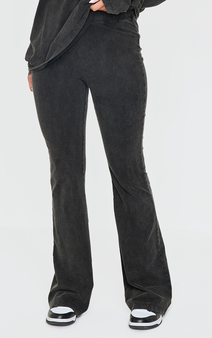 PRETTYLITTLETHING Black Embossed Logo Washed Skinny Flare Pants image 2