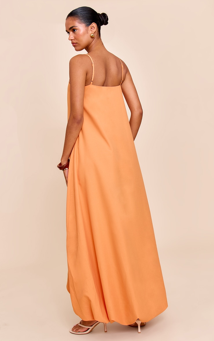 Robe longue fluide orange à bretelles fines image 2