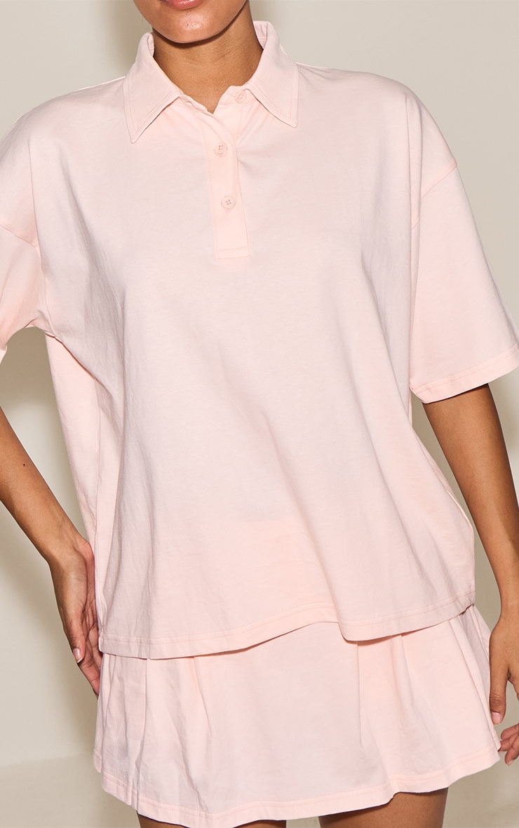 T-shirt oversize rose clair à col replié image 4