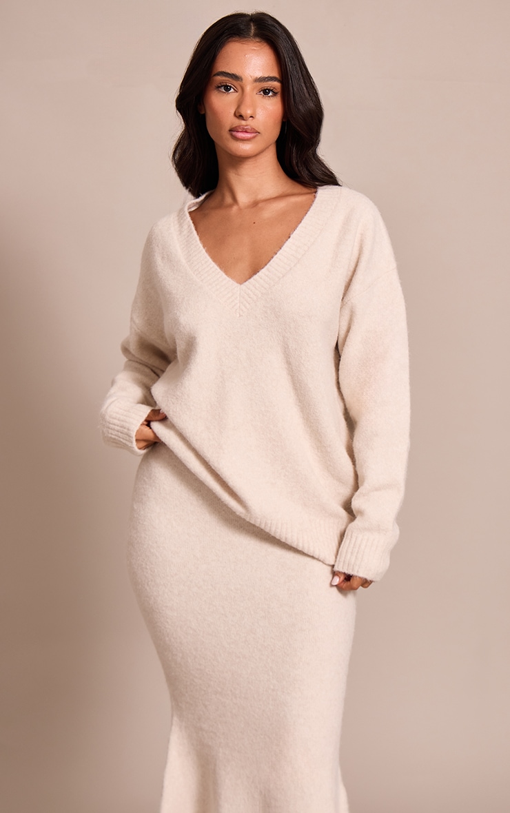 Petite Pull en maille tricot crème à col en V image 1