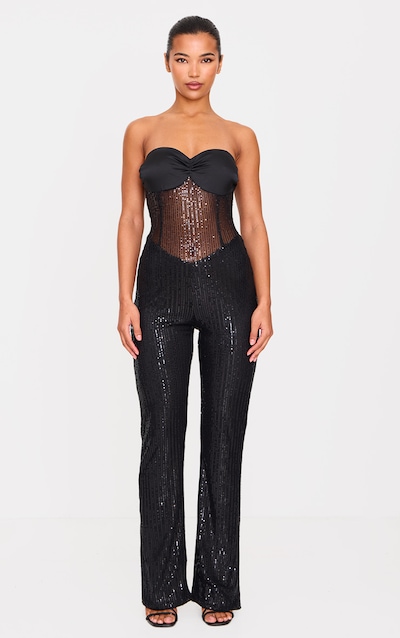 Combinaison bustier noire à sequins et partie transparente