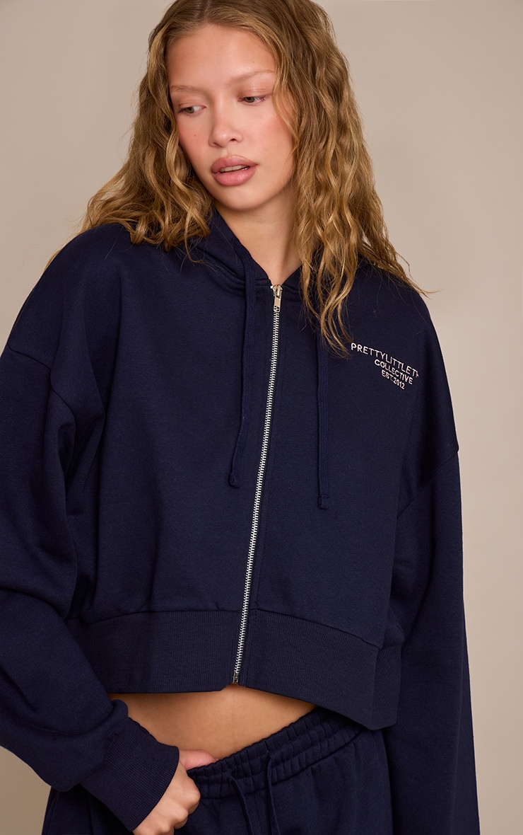 PRETTYLITTLETHING Navy Print Zip Front Hoodie image 1