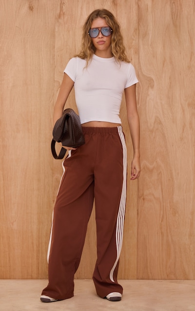 Bas de survêtement en nylon chocolat foncé à rayures sur les côtés