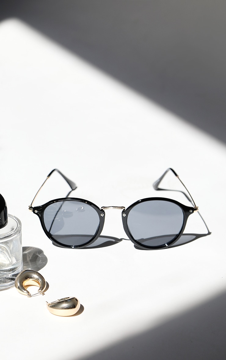 Lunettes noires style rétro à monture ronde