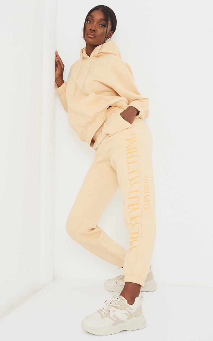 PRETTYLITTLETHING Tall Stone Copyright Sweatpants | Tall ...