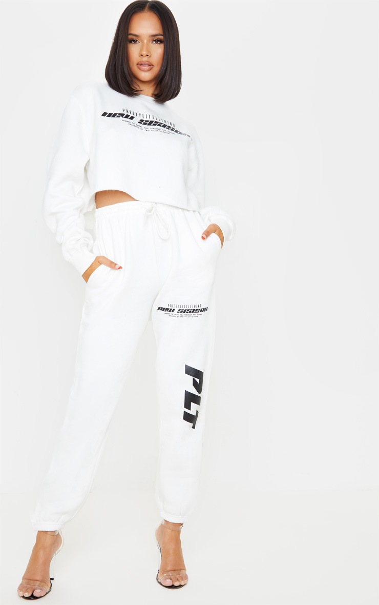 PRETTYLITTLETHING Cream New Season Slogan Cropped Sweater