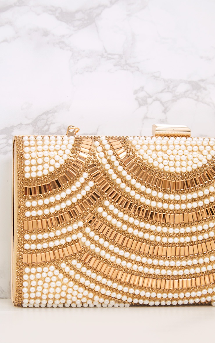 gold embellished clutch