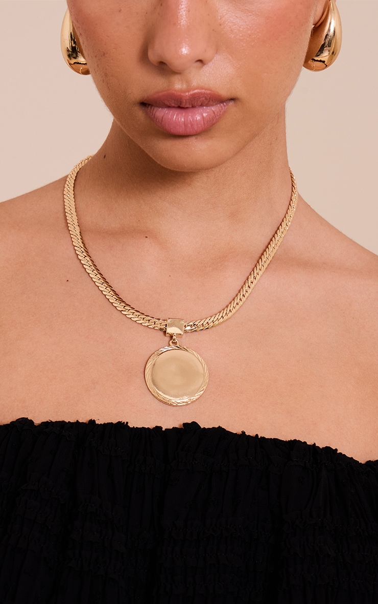 Gold Skinny Chain Necklace With Circular Pendant image 1