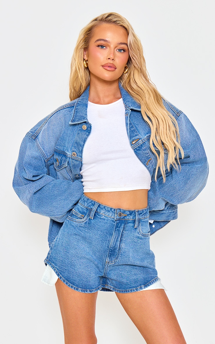 Blue jean shorts with pockets hanging out hotsell