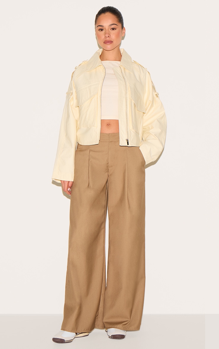 Veste courte crème au beurre à détails trench et zip image 3