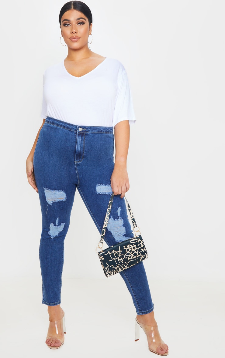 PRETTYLITTLETHING Plus Mid Blue Distressed Disco Jean