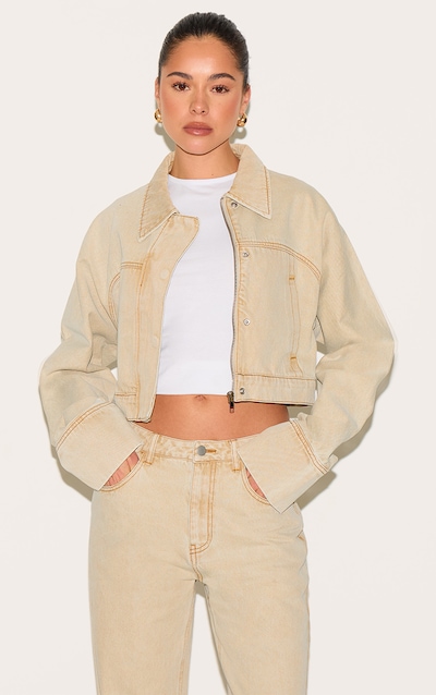 Veste courte gris pierre délavé à boutons cachés et manchettes larges