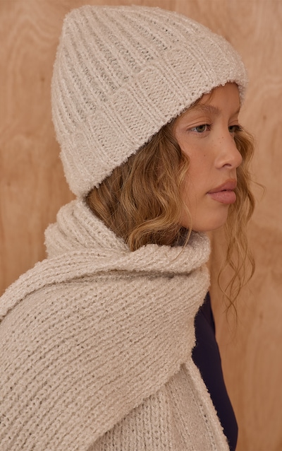 Bonnet en maille tricot boule bicolore crème