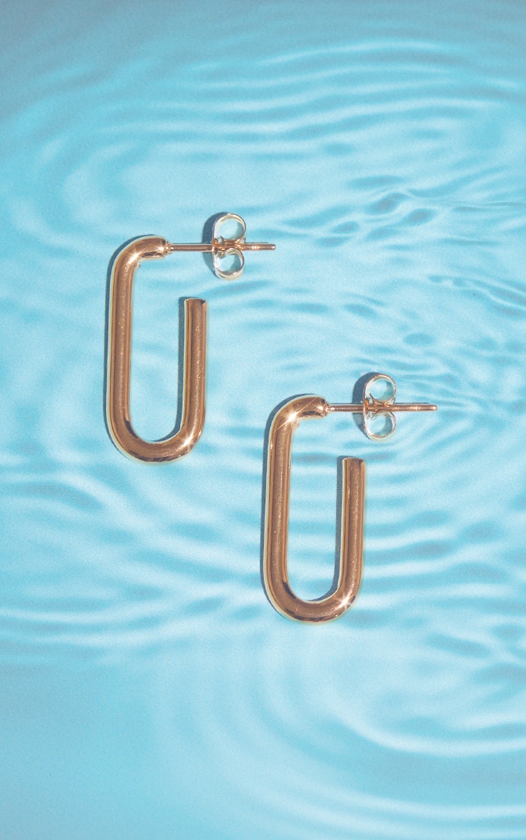 Gold Water Resistant Elongated Hoop Earrings image 1