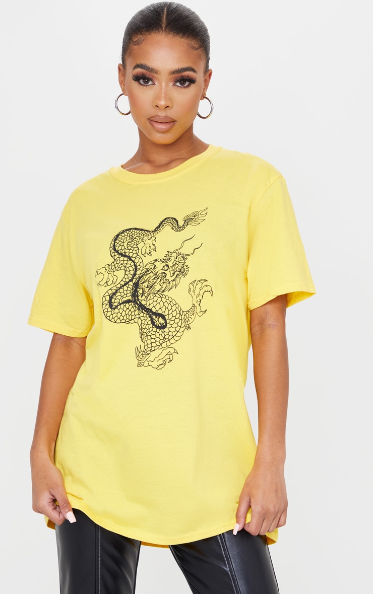 Tee-shirt jaune à imprimé dragon contrastant