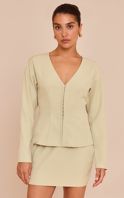 Petite Top long doux vert olive sans col à taille cintrée et agrafes et oeillets