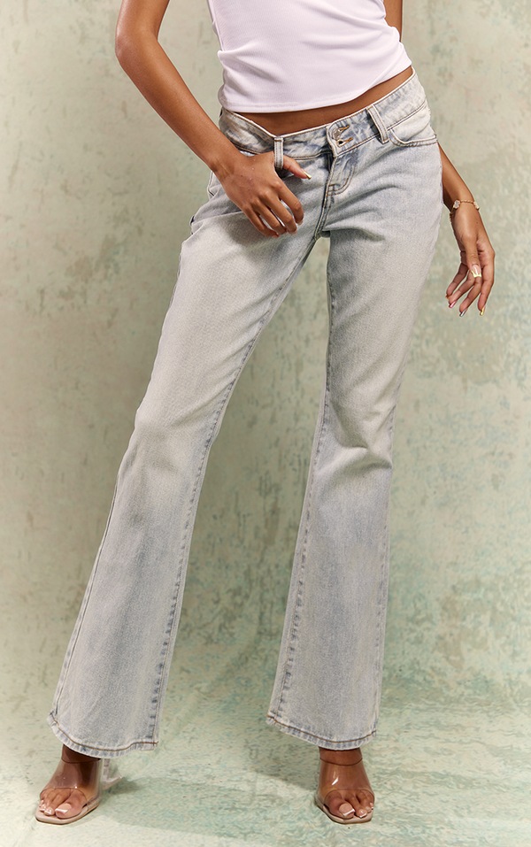 Light Blue Wash Dip Front Low Rise Flared Jeans PrettyLittleThing USA