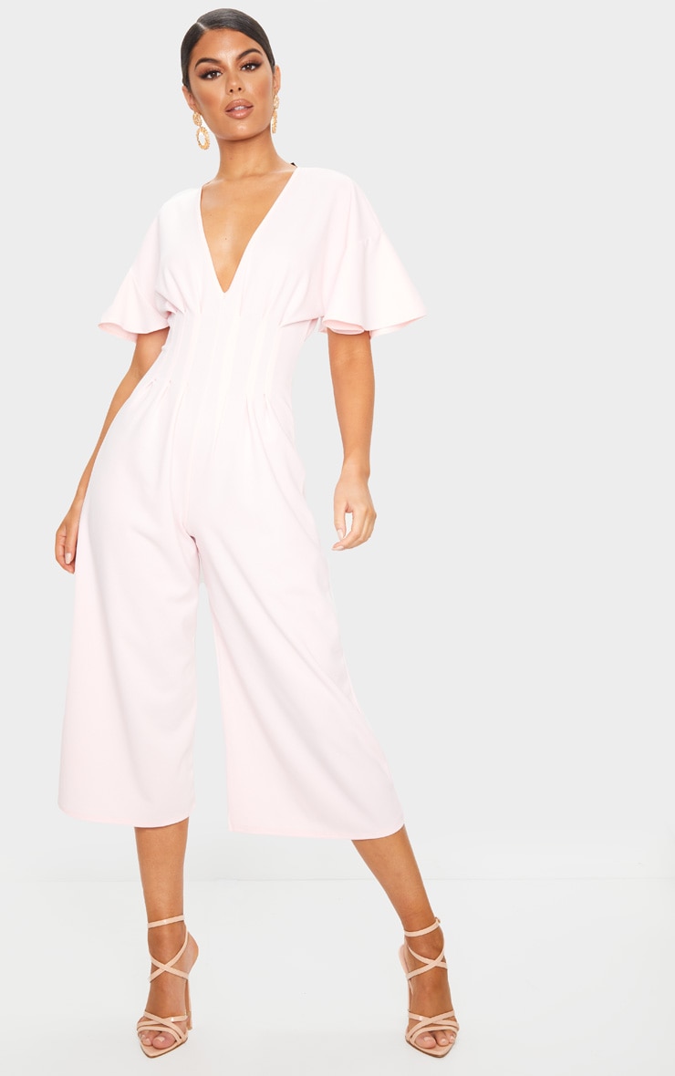 Combinaison décolletée rose cendré à taille plissée et manches courtes