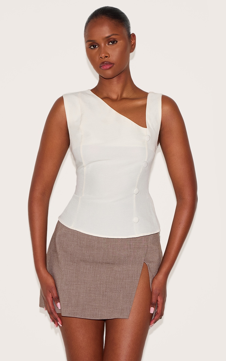 Gilet ajusté crème à détail asymétrique image 1