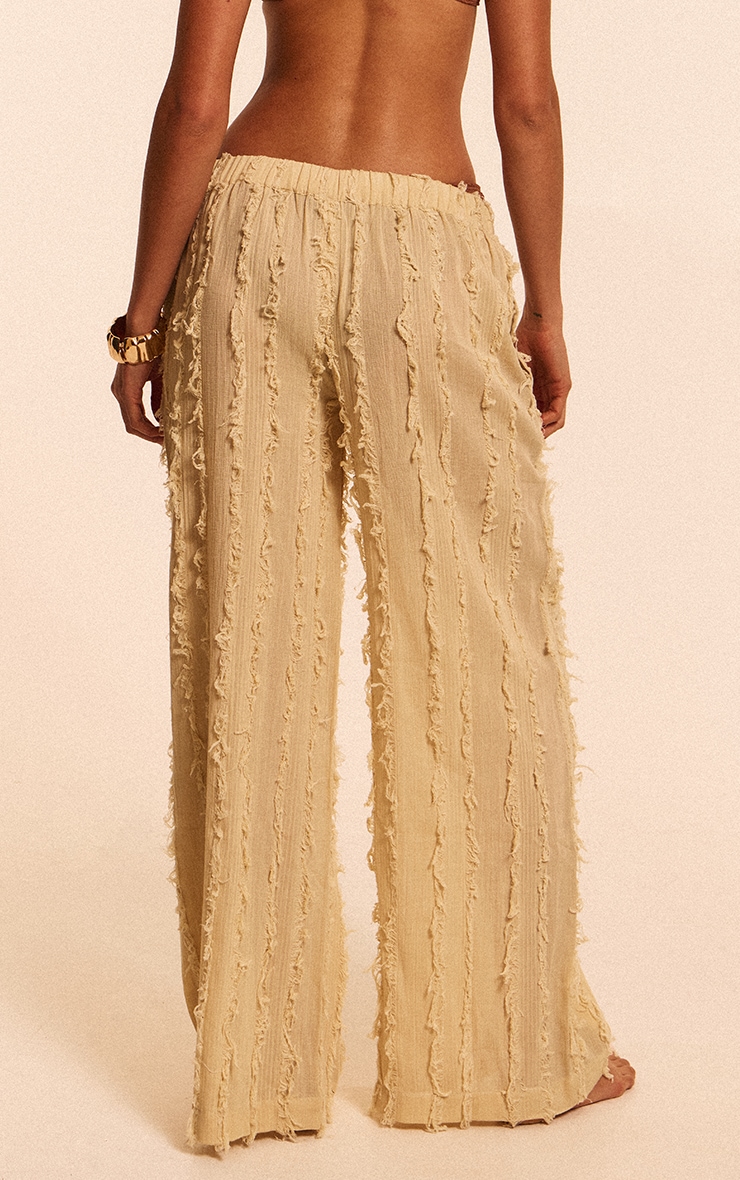 Pantalon en coton gris pierre à lisérés élimés image 3