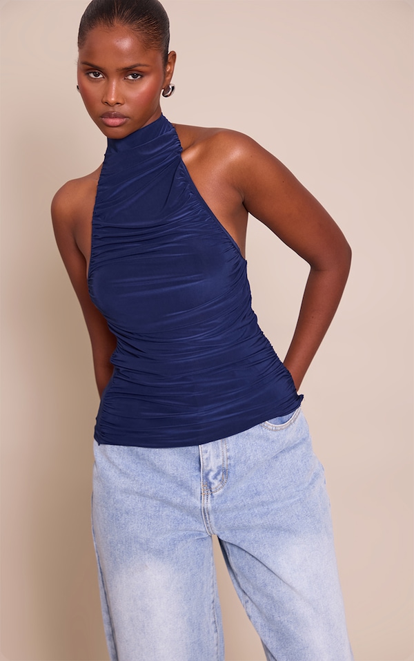 Top long doublé moulant bleu marine drapé à col montant