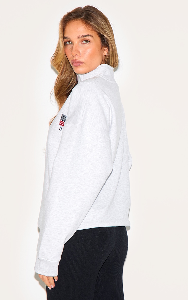 Sweat oversize gris cendré à slogan "USA" et quart de zip image 2