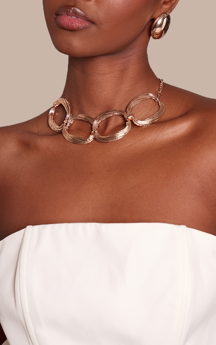 Gold Textured Shimmer Oval Statement Necklace image 1