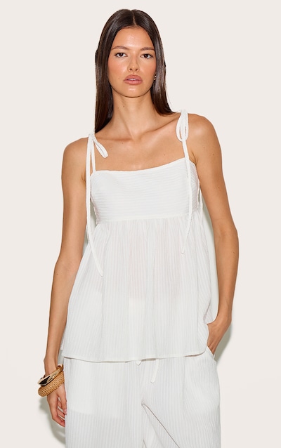 Top fluide tissé texturé blanc à rayures