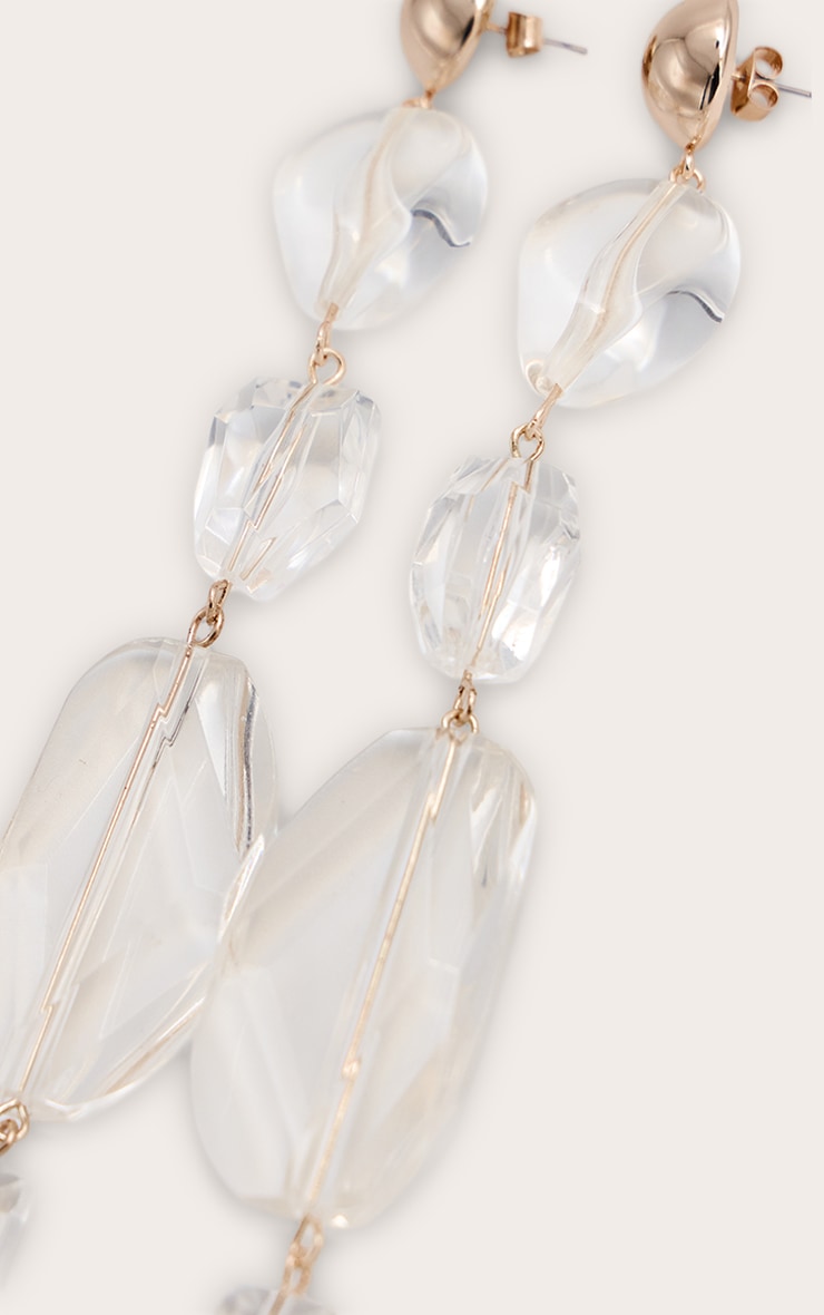 Boucles d'oreilles imposantes tombantes dorées à strass image 3