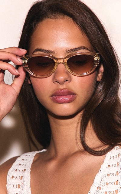 A.KJÆRBEDE Lunettes de soleil rondes, fines, transparentes marron