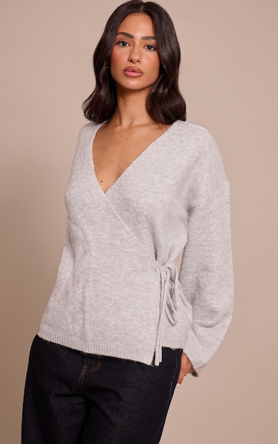 Petite Pull cache-coeur en maille tricot grise nouée sur le côté