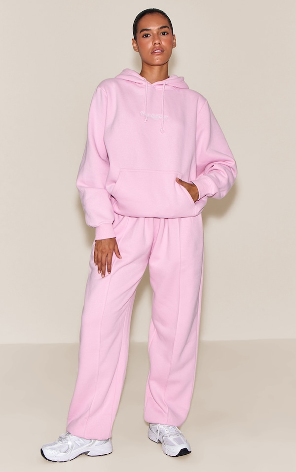 Jogging oversize rose à pinces et ourlets resserrés