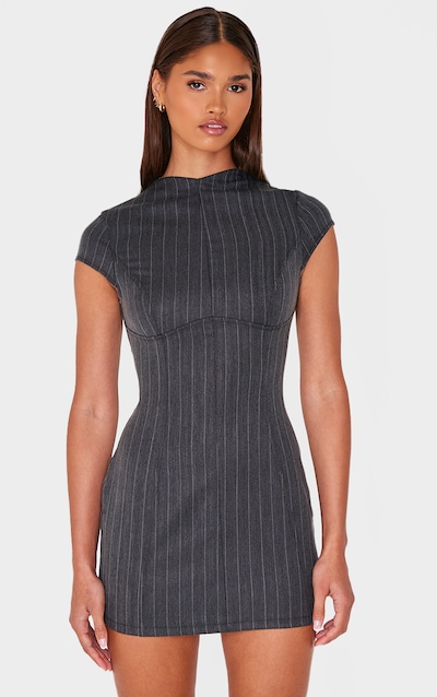 Robe moulante noire à détails coutures et manches courtes