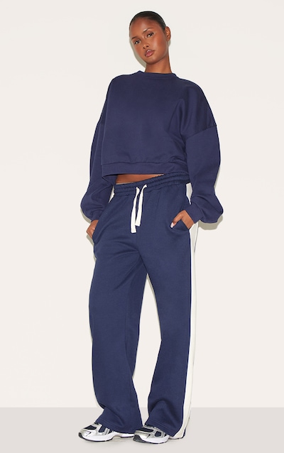 Jogging large en sweat bleu marine à bandes