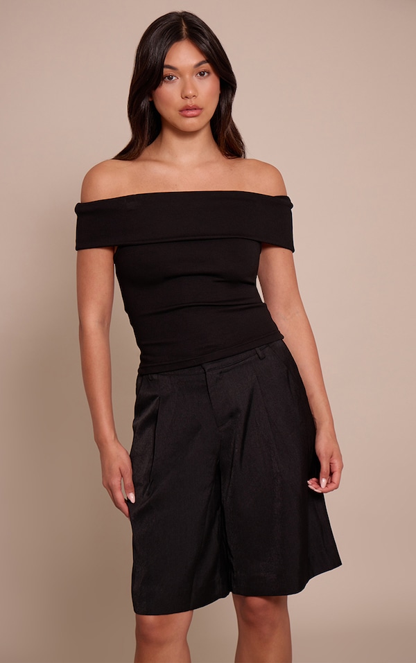 Top doux deluxe noir à épaules asymétriques