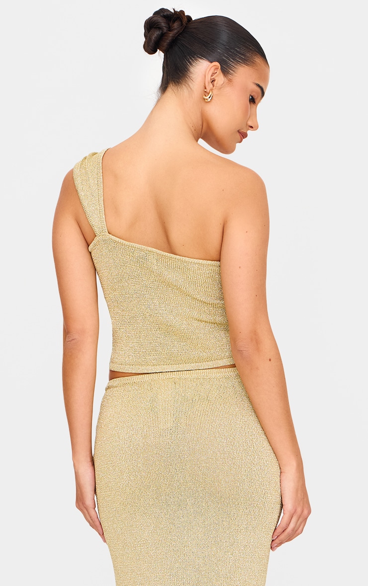 Top asymétrique en maille tricot dorée à paillettes texturées et empiècement image 2