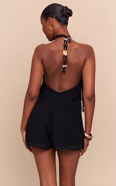 Combishort fluide en mousseline de soie noire à dos nu et perles