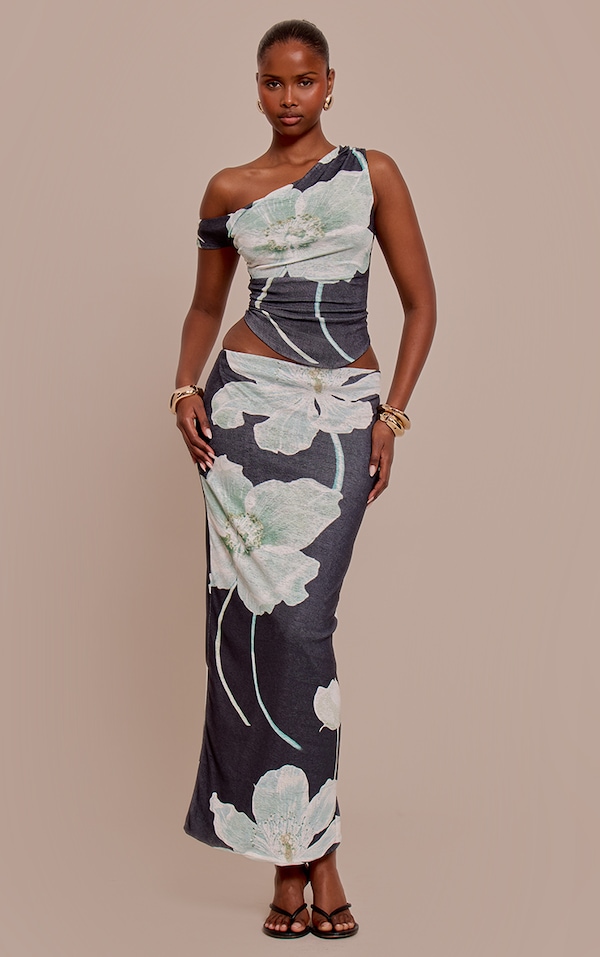 Jupe longue texturée noire fleurie à taille basse