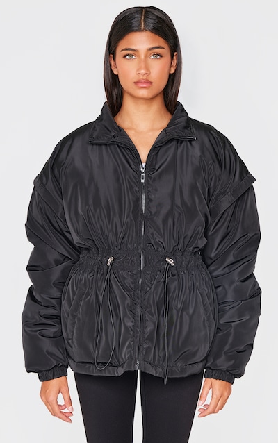 Veste rembourrée noire à taille cintrée