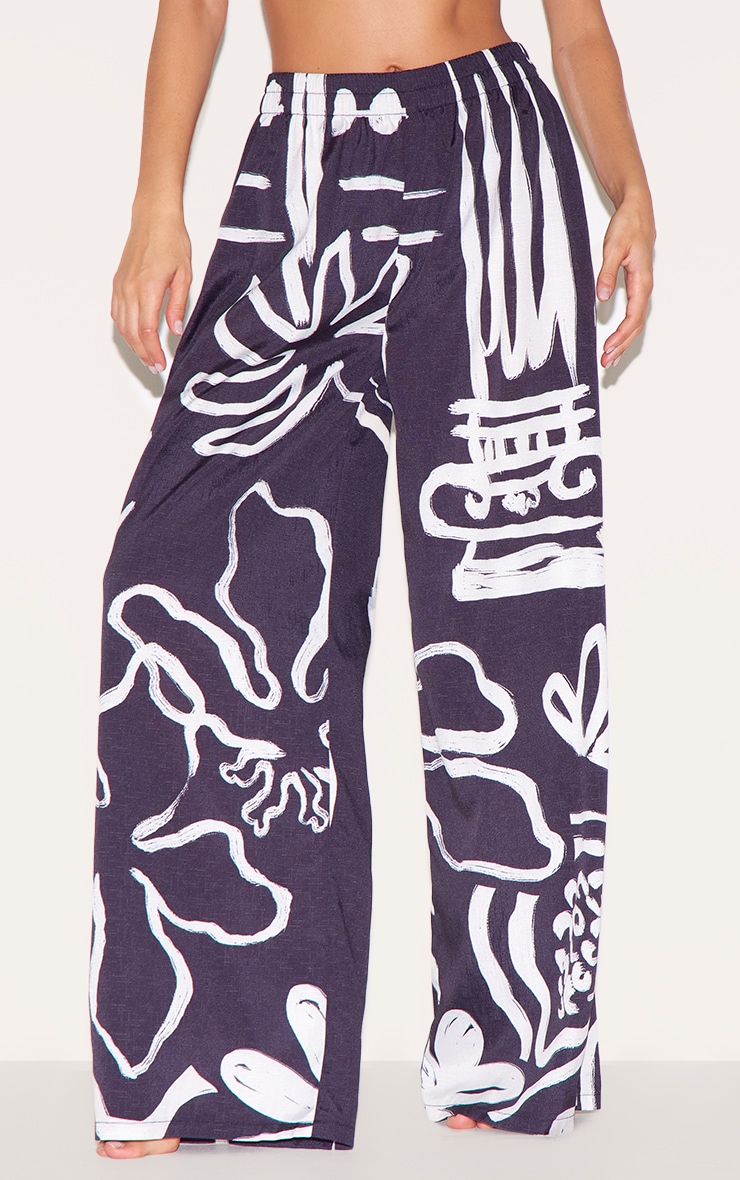 Pantalon de plage en effet lin noir et blanc fleuri image 2