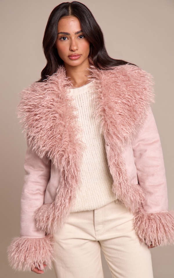 Petite Manteau style afghan en suédine rose à bordures en fausse fourrure