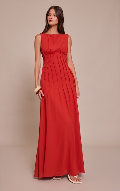 Robe longue en mousseline de soie rouille sans manches plissée