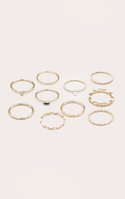 Lot de bagues dorées à perles