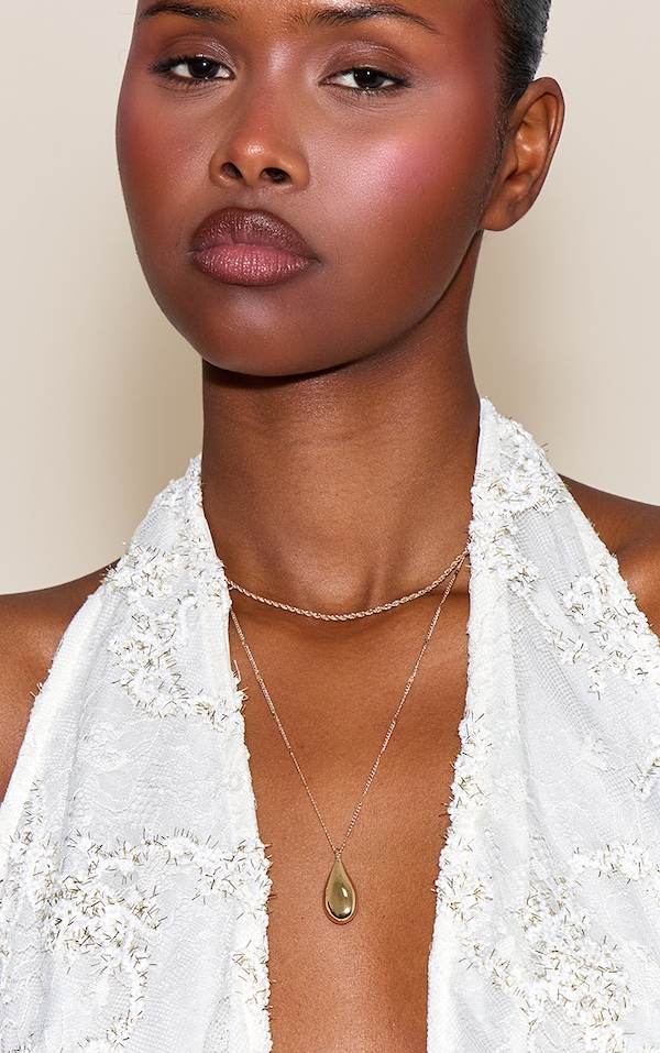 Collier superposé doré à pendentif goutte d'eau