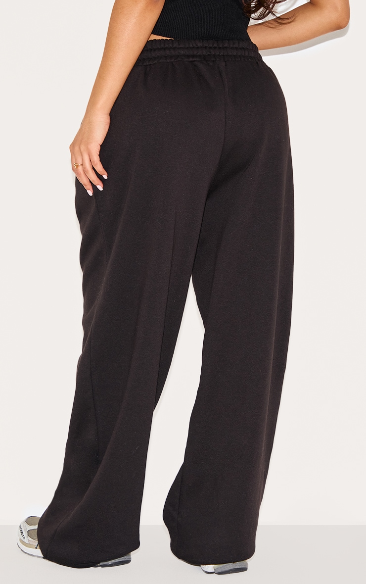 Petite Jogging large noir à taille élastique et cordons ajustables image 3