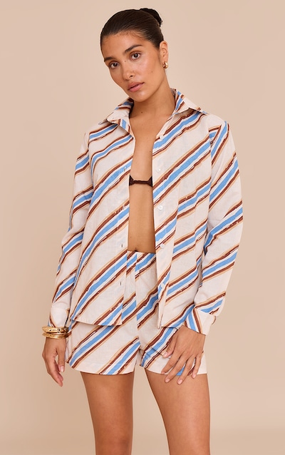 Petite Chemise en effet lin bleu à rayures et boutons